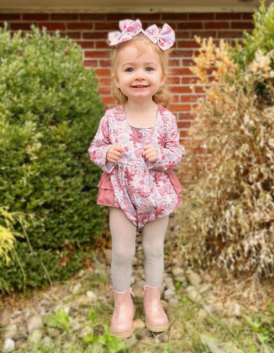 Pink snowflake ruffle romper