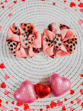 Leopard hearts messy piggies