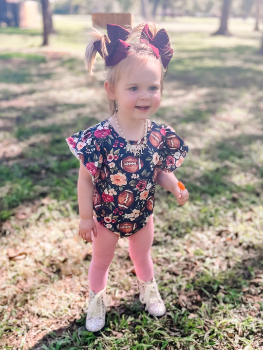 Navy football floral leo