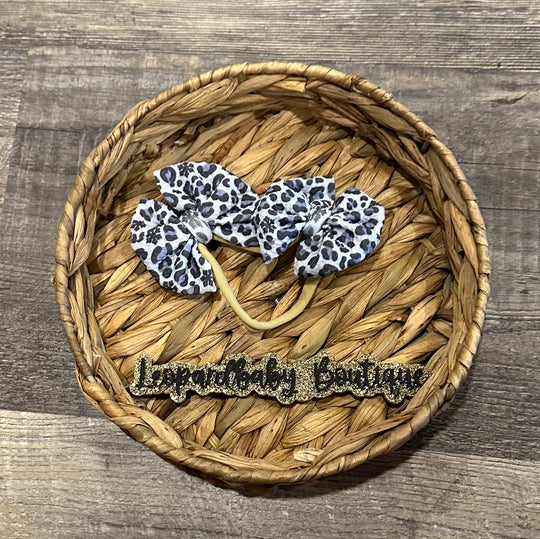 Snowflake leopard messy piggies on nylon