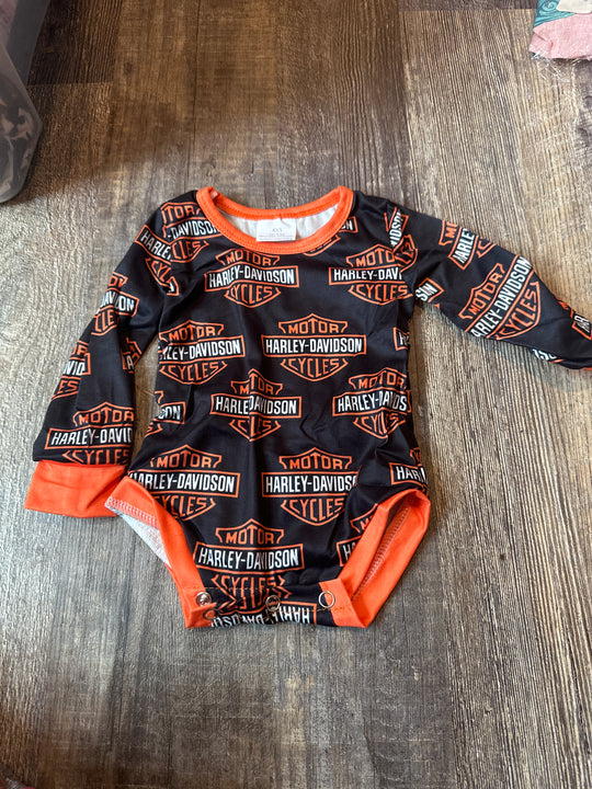 Orange and black romper