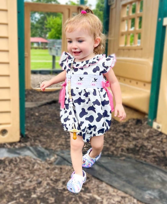 Pink Cow smocked romper