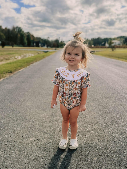 Vintage floral Smocked child of god romper