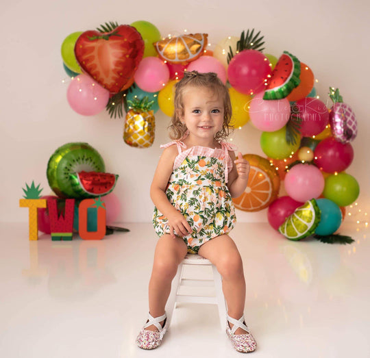 Floral fruit romper