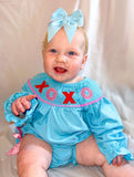 Blue XOXO smocked romper