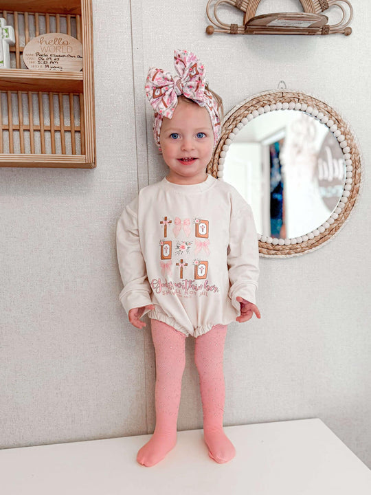 Coquette Cross sweater romper