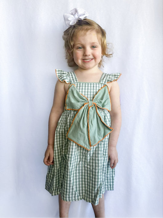 Green woven bow dress