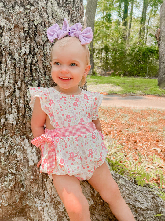Pink and purple floral romper
