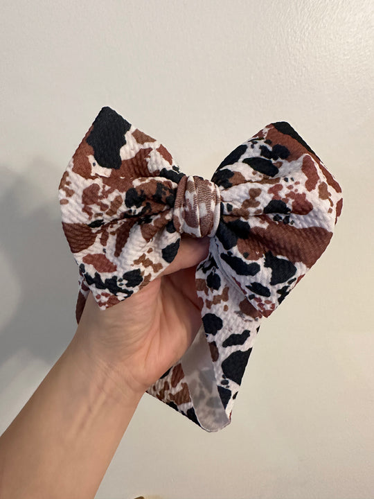 Brown and black cow spots classic bow