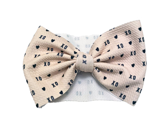 Cream XOXO bow