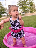 Cow print swimsuit with pink ruffle