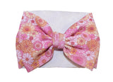 Pink and orange retro floral bow