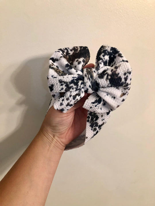 Messy brown and black cow wrap