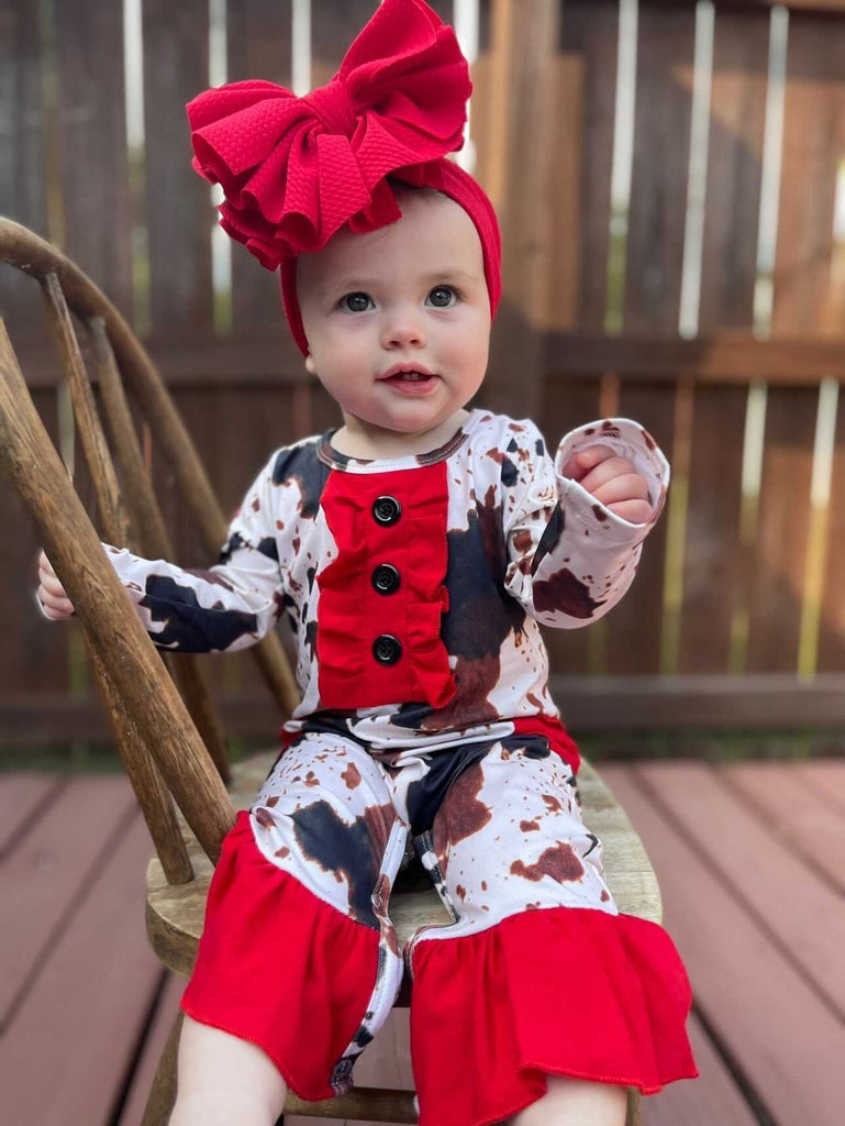 Cow romper with red trim