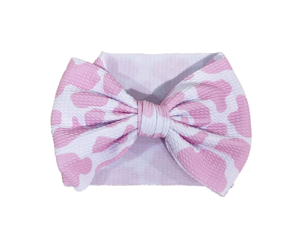 Pink cow spots bow