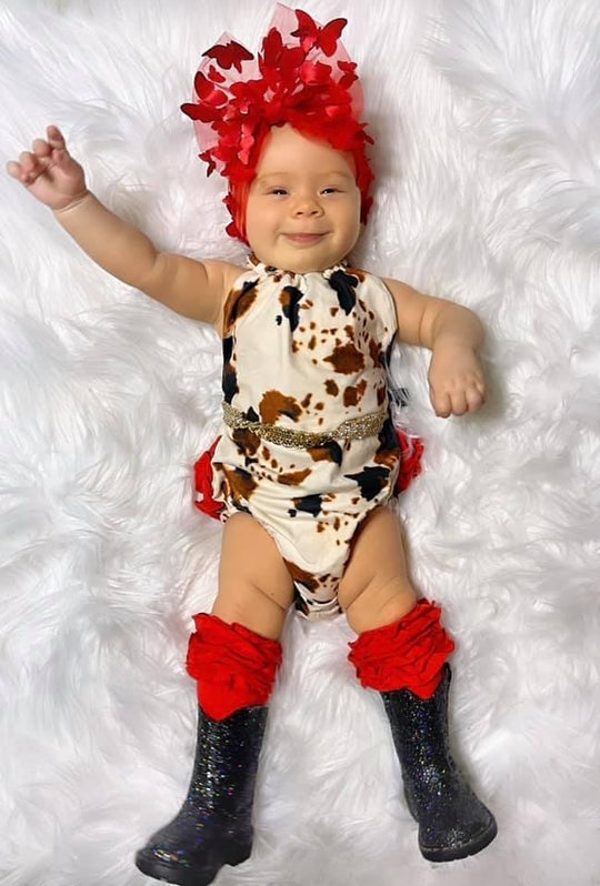 Cow tie romper with red ruffles