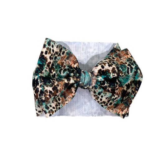 Turquoise cowhide bow