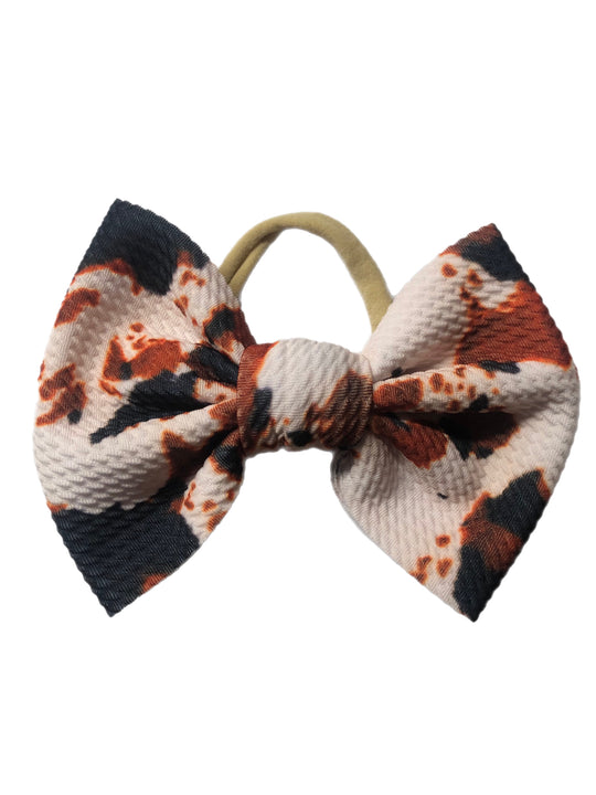 Burnt orange cow Nylon Bow