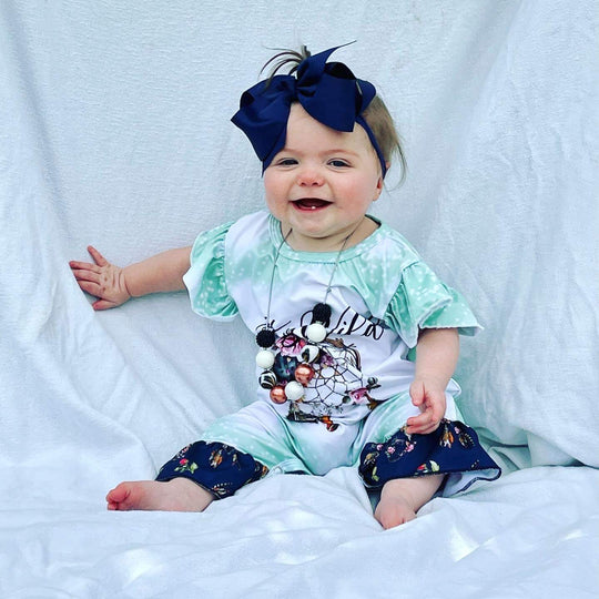 Mint stay wild romper