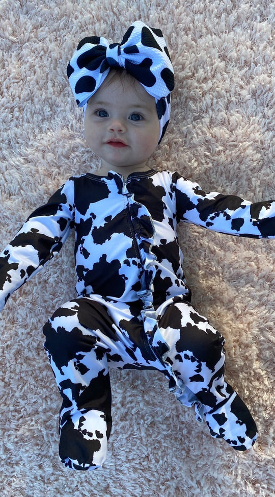 Cow spots footie sleeper with ruffle- sleeper ONLY