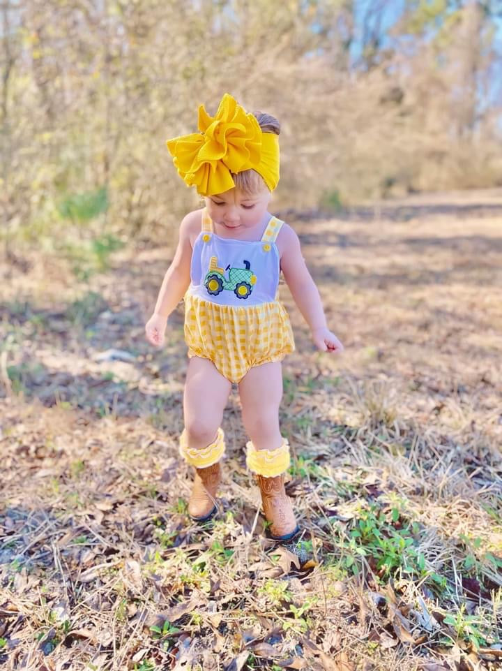 Yellow checkered tractor romper
