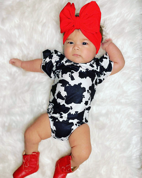 Cow spots bodysuit