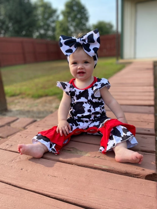 Black cow romper with red trim