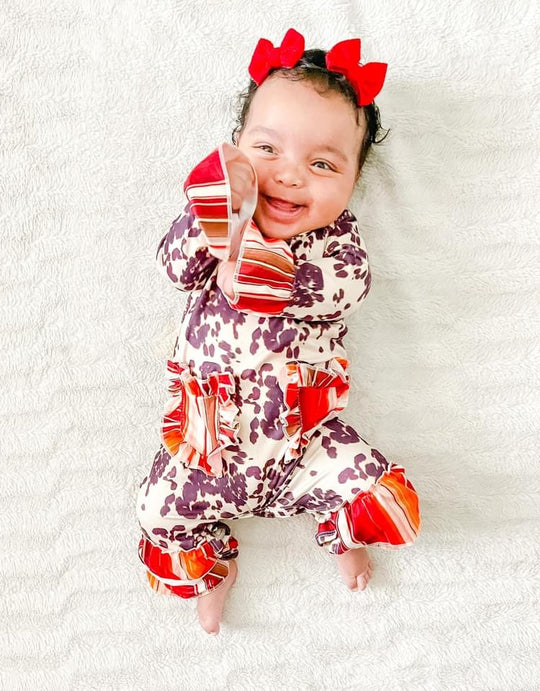 Brown cowhide and serape romper